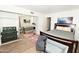 Spacious bedroom with a mirrored closet, hardwood floors, and comfortable furniture at 7777 E Main St # 227, Scottsdale, AZ 85251