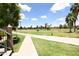 Scenic golf course view with a paved path perfect for walking and enjoying the outdoors at 7777 E Main St # 227, Scottsdale, AZ 85251