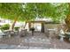 Inviting outdoor grilling area with tables, seating, and a built-in BBQ for community gatherings at 7777 E Main St # 227, Scottsdale, AZ 85251