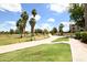 Lush walking path offers a scenic view of the manicured golf course and community at 7777 E Main St # 227, Scottsdale, AZ 85251