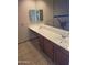 Accessible bathroom with dual sinks, vanity, and tiled floors at 7914 E Bonita Dr, Scottsdale, AZ 85250