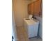 Laundry room featuring washer, dryer, and storage cabinets at 7914 E Bonita Dr, Scottsdale, AZ 85250