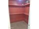 Walk-in pantry with tiled floor and ample shelving storage at 7914 E Bonita Dr, Scottsdale, AZ 85250
