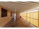 Long covered parking area for storing vehicles or relaxing outside in the shade at 8103 E Southern Ave # 119, Mesa, AZ 85209