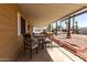 Covered patio featuring a table and chairs at 8103 E Southern Ave # 119, Mesa, AZ 85209