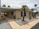 Charming single-story home with covered patio and meticulously landscaped front yard at 8103 E Southern Ave # 119, Mesa, AZ 85209