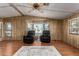 Inviting living room featuring hardwood floors, recessed windows, and ample natural light at 8103 E Southern Ave # 119, Mesa, AZ 85209