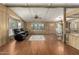 Large inviting living room featuring hardwood floors, recessed windows, and ample natural light at 8103 E Southern Ave # 119, Mesa, AZ 85209
