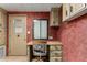 Office space featuring a desk, chair, and storage cabinets at 8103 E Southern Ave # 119, Mesa, AZ 85209