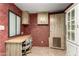Office space featuring a desk, chair, and storage cabinets at 8103 E Southern Ave # 119, Mesa, AZ 85209