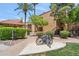 Charming walkway and bike rack in the building exterior amidst lush landscaping at 8787 E Mountain View Rd # 1100, Scottsdale, AZ 85258
