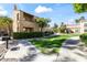 Exterior shot shows manicured landscaping with walkways around the community at 8787 E Mountain View Rd # 1100, Scottsdale, AZ 85258
