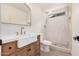 Updated bathroom featuring a vanity, a mirror, a beautiful shower, and natural light at 9414 N 50Th Dr, Glendale, AZ 85302