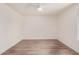 This bedroom features neutral paint, modern ceiling fan, and wood-look floors at 9414 N 50Th Dr, Glendale, AZ 85302