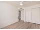 Bedroom featuring bright natural light, a ceiling fan, and convenient closet space at 9414 N 50Th Dr, Glendale, AZ 85302