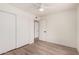 Bedroom featuring bright natural light, a ceiling fan, and convenient closet space at 9414 N 50Th Dr, Glendale, AZ 85302