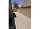 A private and enclosed backyard with gravel and block wall is ready for your personal design at 1015 S Val Vista Dr # 52, Mesa, AZ 85204