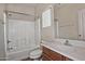 Clean bathroom featuring a shower-tub combo, tile flooring, and modern fixtures at 1015 S Val Vista Dr # 52, Mesa, AZ 85204