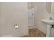 Cozy bathroom with a glass shower, pedestal sink, and neutral tile at 1015 S Val Vista Dr # 52, Mesa, AZ 85204