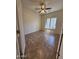 Neutral bedroom with tile floors, ceiling fan, window and white walls at 1015 S Val Vista Dr # 52, Mesa, AZ 85204