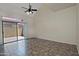 Bright bedroom with sliding doors to patio and fan at 1015 S Val Vista Dr # 52, Mesa, AZ 85204