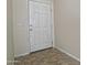 Entryway with tile flooring and white front door at 1015 S Val Vista Dr # 52, Mesa, AZ 85204