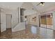 Spacious living room featuring tile floors and staircase to the second level at 1015 S Val Vista Dr # 52, Mesa, AZ 85204