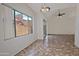 Open concept living and dining room featuring tile flooring and natural light at 1015 S Val Vista Dr # 52, Mesa, AZ 85204