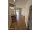 Carpeted staircase from the first floor to the second floor with railings and tile floors on the ground floor at 1015 S Val Vista Dr # 52, Mesa, AZ 85204