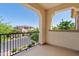 This balcony offers neighborhood views and a charming wrought iron railing for enjoying the outdoors at 10331 E Starion Ave, Mesa, AZ 85212