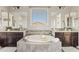 Luxurious bathroom featuring a soaking tub, dual vanities, and stylish tile work at 10331 E Starion Ave, Mesa, AZ 85212