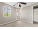 Bedroom offering natural light and access to a balcony with an adjacent room perfect for an office or sitting area at 10331 E Starion Ave, Mesa, AZ 85212