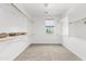 Spacious walk-in closet with built-in shelving, ample storage, and a window for natural light at 10331 E Starion Ave, Mesa, AZ 85212