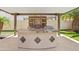 Built-in outdoor kitchen with marble countertops, grill, and storage, ideal for entertaining and alfresco dining at 10331 E Starion Ave, Mesa, AZ 85212