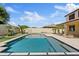Inviting backyard features a sparkling pool, spa, well-maintained landscaping and an enclosed fence at 10331 E Starion Ave, Mesa, AZ 85212