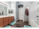 Bright bathroom featuring a double vanity, modern fixtures, and separate shower and tub at 11361 E Escondido Ave, Mesa, AZ 85208