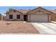 Beautiful single-story home featuring a well-maintained front yard with desert landscaping at 11361 E Escondido Ave, Mesa, AZ 85208