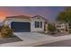 Charming home with a tile roof, desert landscaping, and an attached two-car garage at 11658 E Chevelon Trl, Gold Canyon, AZ 85118
