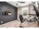 Functional home office featuring a large desk, ergonomic chair, and efficient workspace setup at 11658 E Chevelon Trl, Gold Canyon, AZ 85118