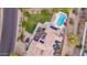Bird's eye view of the backyard, featuring a refreshing pool, tiled patio, and green lawn at 12015 S Tuzigoot Dr, Phoenix, AZ 85044