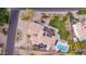 Overhead view of the backyard, showcasing a tiled patio, swimming pool, and landscaping at 12015 S Tuzigoot Dr, Phoenix, AZ 85044