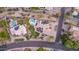 Stunning aerial view of property showcasing a pool and backyard, offering a private outdoor space at 12015 S Tuzigoot Dr, Phoenix, AZ 85044