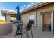 Cozy outdoor balcony with seating, offering a relaxing space with a view of the neighborhood at 12015 S Tuzigoot Dr, Phoenix, AZ 85044
