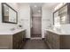 Modern bathroom featuring double vanity sinks, tiled shower, and updated finishes at 12015 S Tuzigoot Dr, Phoenix, AZ 85044