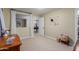 Bedroom view into adjoining game room featuring modern decor and natural light at 12015 S Tuzigoot Dr, Phoenix, AZ 85044