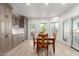 Bright kitchen area featuring cabinetry, stainless appliances and an adjacent dining area at 12015 S Tuzigoot Dr, Phoenix, AZ 85044