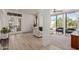 Inviting living room with modern furnishings, large windows, and light wood flooring for a bright, open feel at 12015 S Tuzigoot Dr, Phoenix, AZ 85044