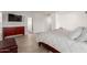 Light and airy main bedroom featuring a modern dresser, TV, and neutral tones at 12015 S Tuzigoot Dr, Phoenix, AZ 85044