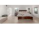 Spacious main bedroom featuring modern decor, ample natural light, and clean lines at 12015 S Tuzigoot Dr, Phoenix, AZ 85044