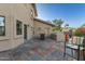 Exterior patio featuring decorative tile, offering an inviting outdoor living space with beautiful desert landscape at 12015 S Tuzigoot Dr, Phoenix, AZ 85044
